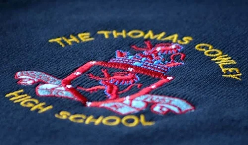 Work uniforms with embroidered logos at Delaware County Shirt Printing, Upper Darby PA